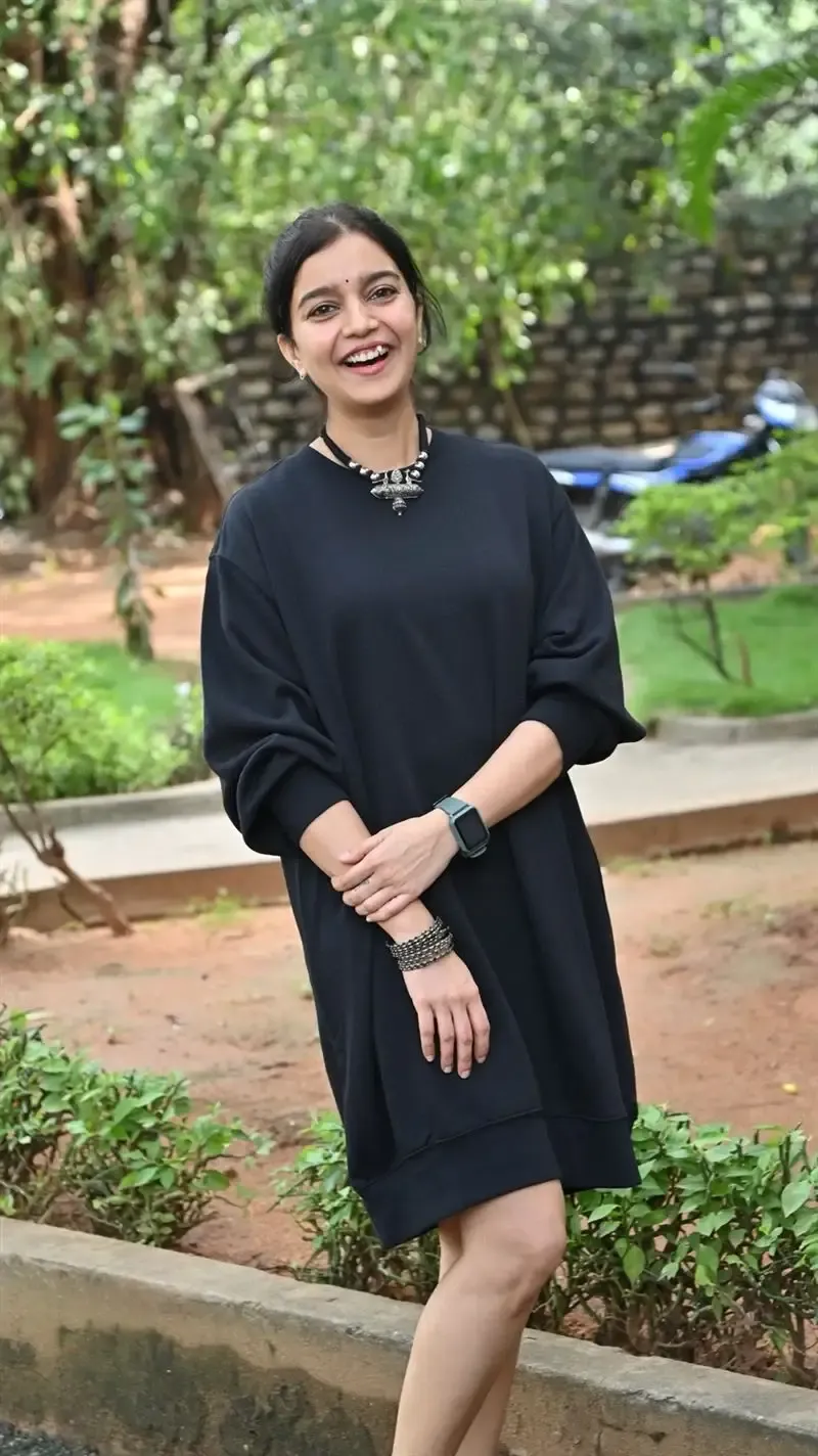 Actress Colors Swathi in Black Dress at Month Of Madhu Movie Press Meet